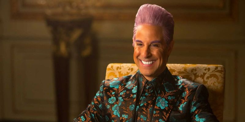 Stanley Tucci as Caesar Flickerman